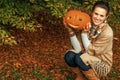 Happy woman with Halloween pumpkin Jack OÃ¢â¬â¢Lantern Royalty Free Stock Photo